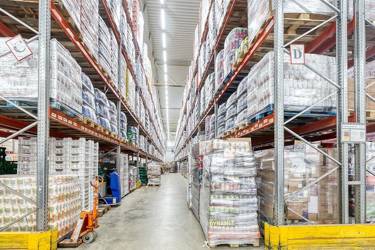Warehouse aisle with stocked shelves